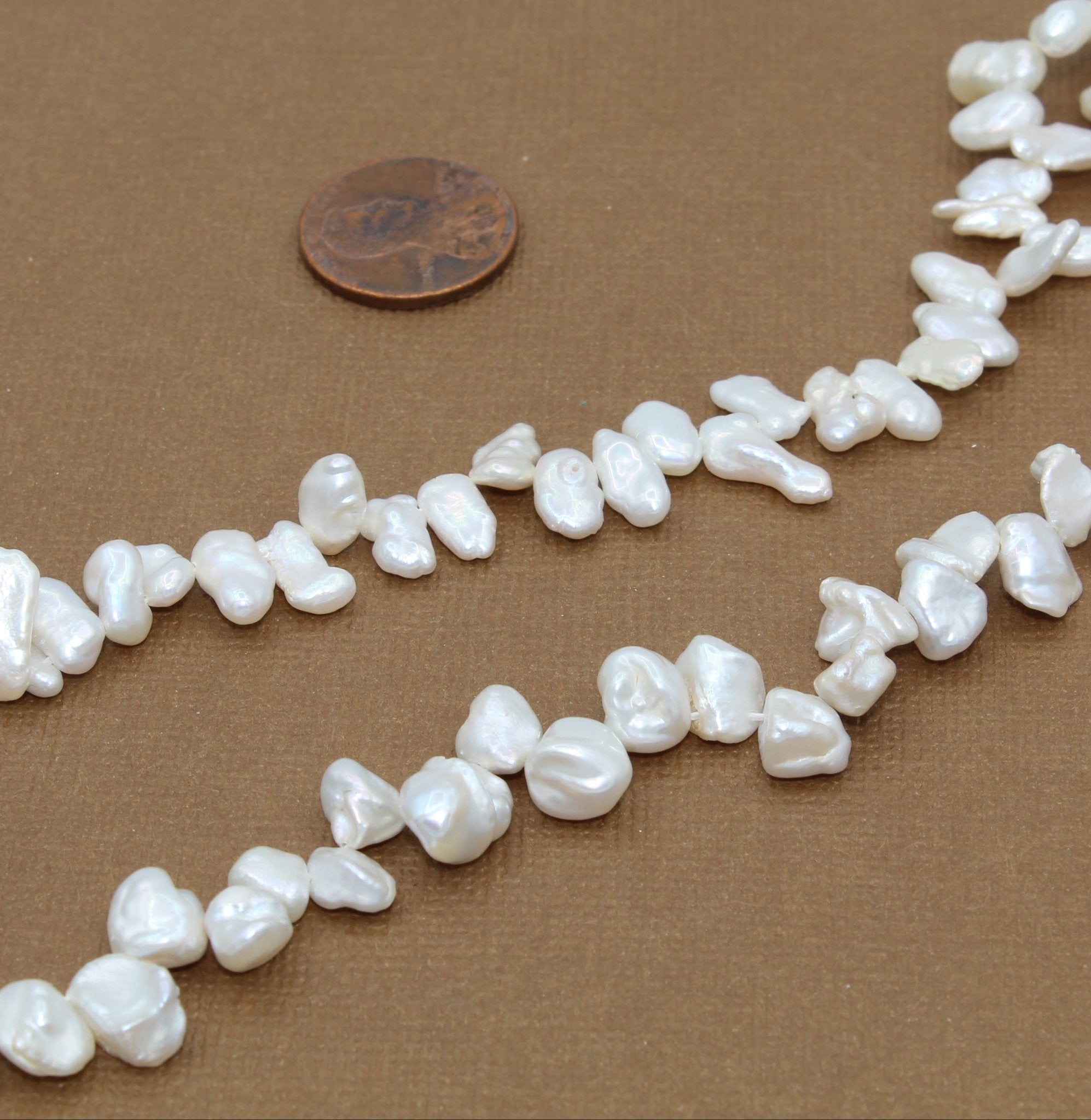 white oblong keshi pearls