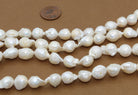 white irregular round pearl beads