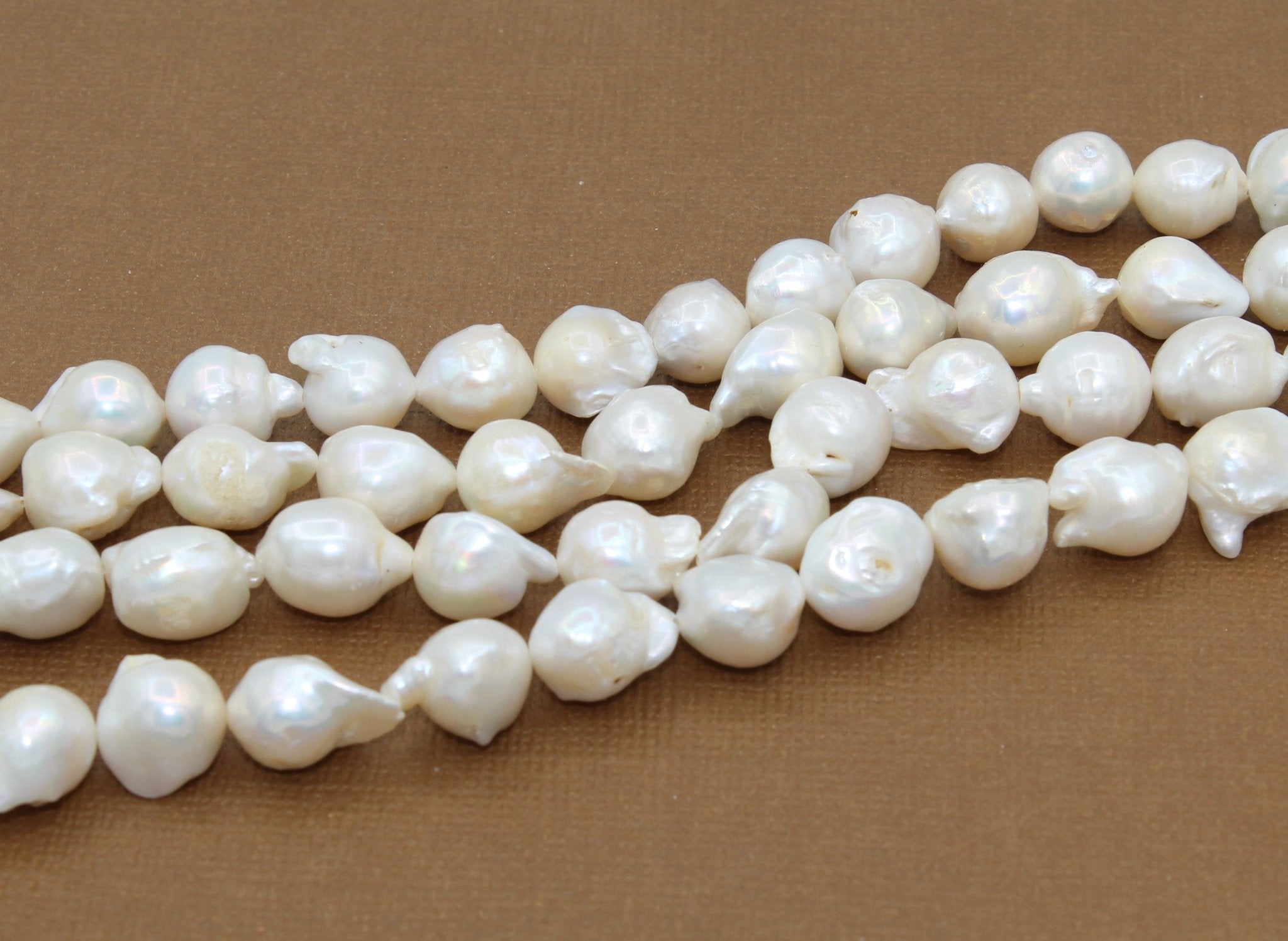 white irregular round pearl beads