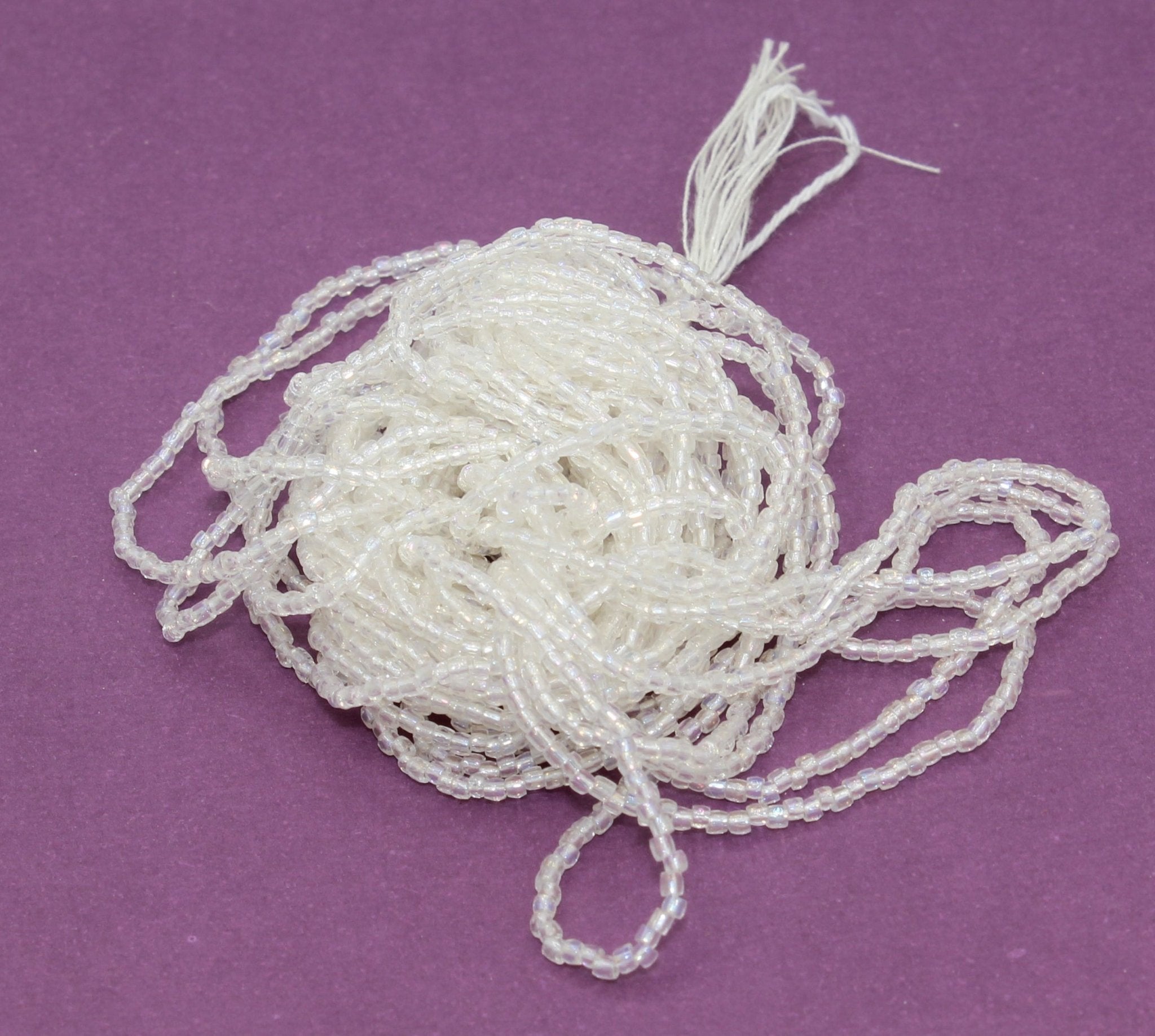 Crystal rainbow trim-cut seed beads 